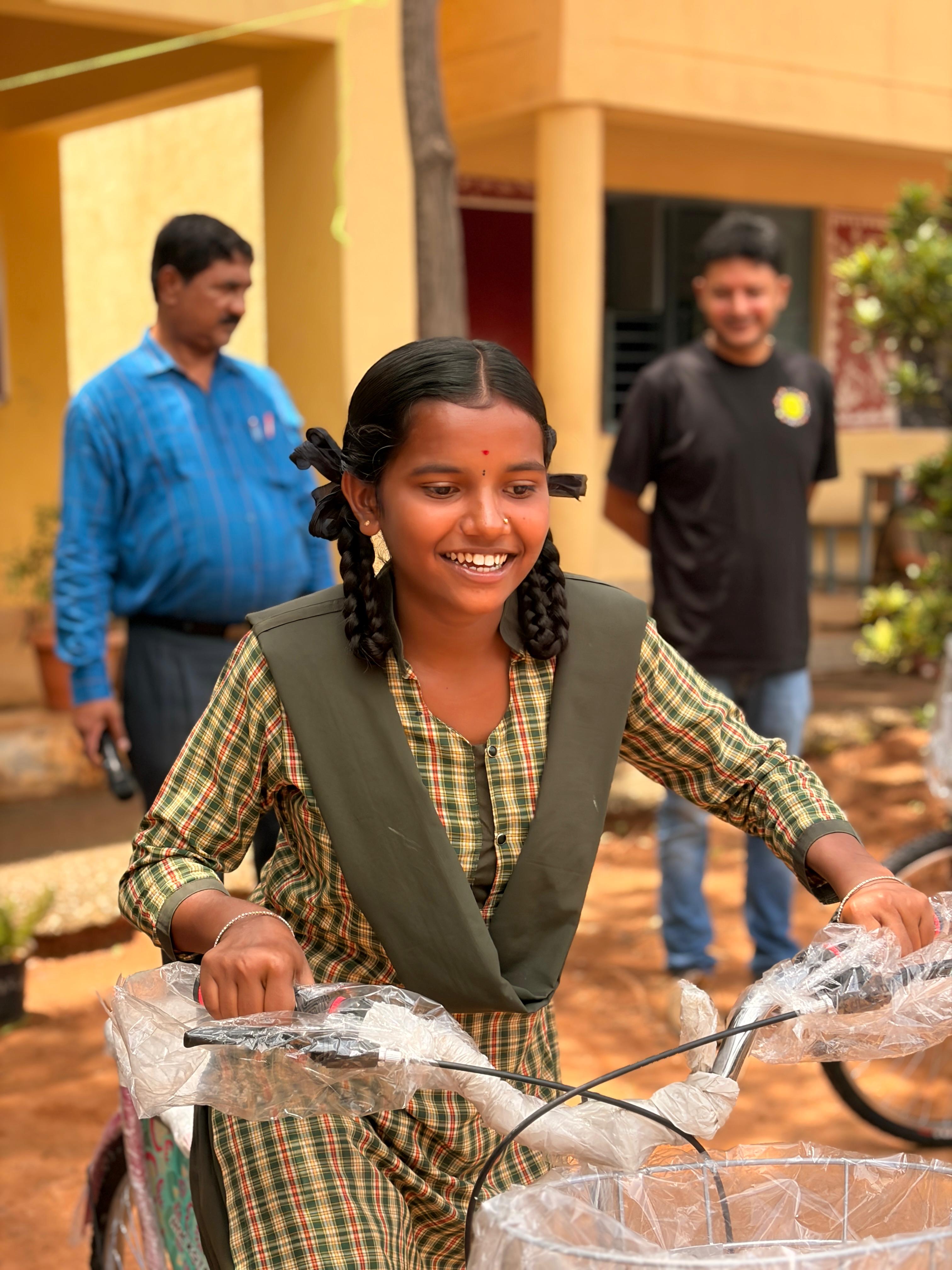 A student takes charge of her new bicycle